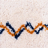 original Berber carpet with intricate abstract symbols, adding an artistic, boho touch to any space