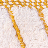 Blossom rug, a Beni Ourain masterpiece with natural honey tones against creamy white wool