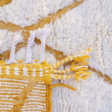 Blossom rug, a Beni Ourain masterpiece with natural honey tones against creamy white wool