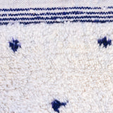 Blue Dalmatian rug, creamy white with indigo blue dots, adding natural charm and coziness to any decor. A stunning Beni Ourain piece
