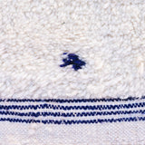 Blue Dalmatian rug, creamy white with indigo blue dots, adding natural charm and coziness to any decor. A stunning Beni Ourain piece