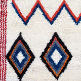 Prosperity Runner Moroccan Rug: featuring white, blue, tangerine, red, and black colors. Handcrafted with tribal symbols