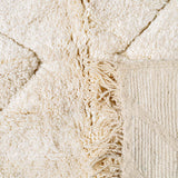 Sand Storm Moroccan Rug, crafted from 100% wool, featuring intricate white patterns for authentic comfort and timeless style